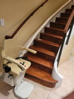Handicare Freecurve stairlift at basement level in Philadelphia home from Lifeway Mobility