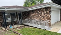 aluminum wheelchair ramp with vertical pickets installed in Mundelein by Lifeway Mobility