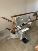 curved stairlift with rail overrun in San Jose home