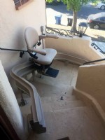 outdoor Bruno Elite curved stairlift installed in Long Beach CA