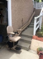 outdoor Bruno Elite curved stairlift installed in Los Angeles