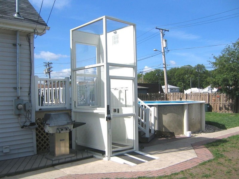 outdoor wheelchair lift installed for pool