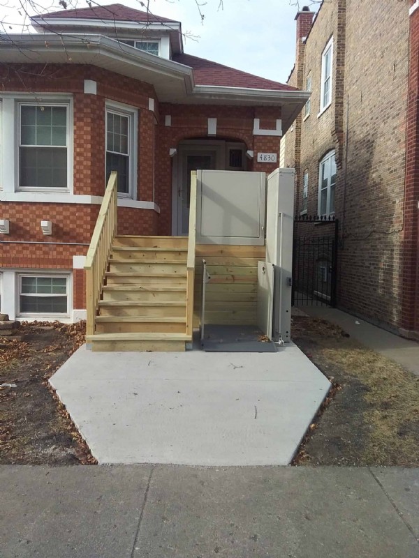 porch lift installed in winter season to provide access to front door of home in Chicago