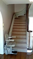 Custom curved Bruno Elite stair lift installed in a local home
